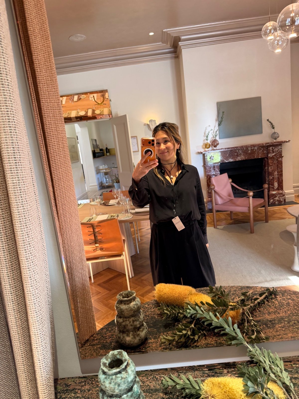 Youki of Sugar Bee Flowers at the Chandon Homestead with banksia stems laid out for the native flower brief