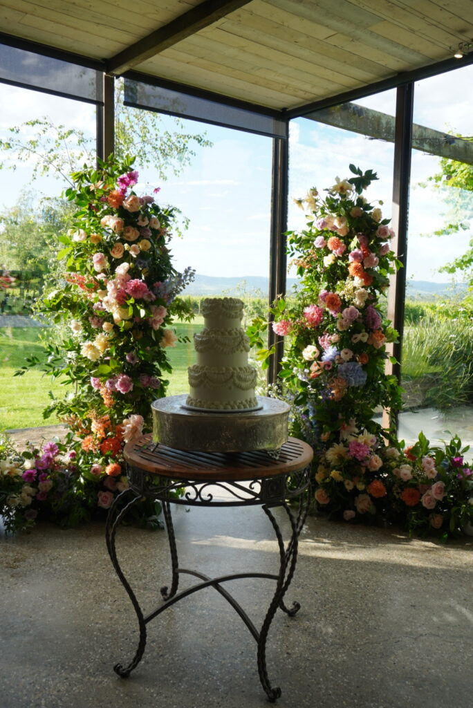 Wedding cake adorned with florals