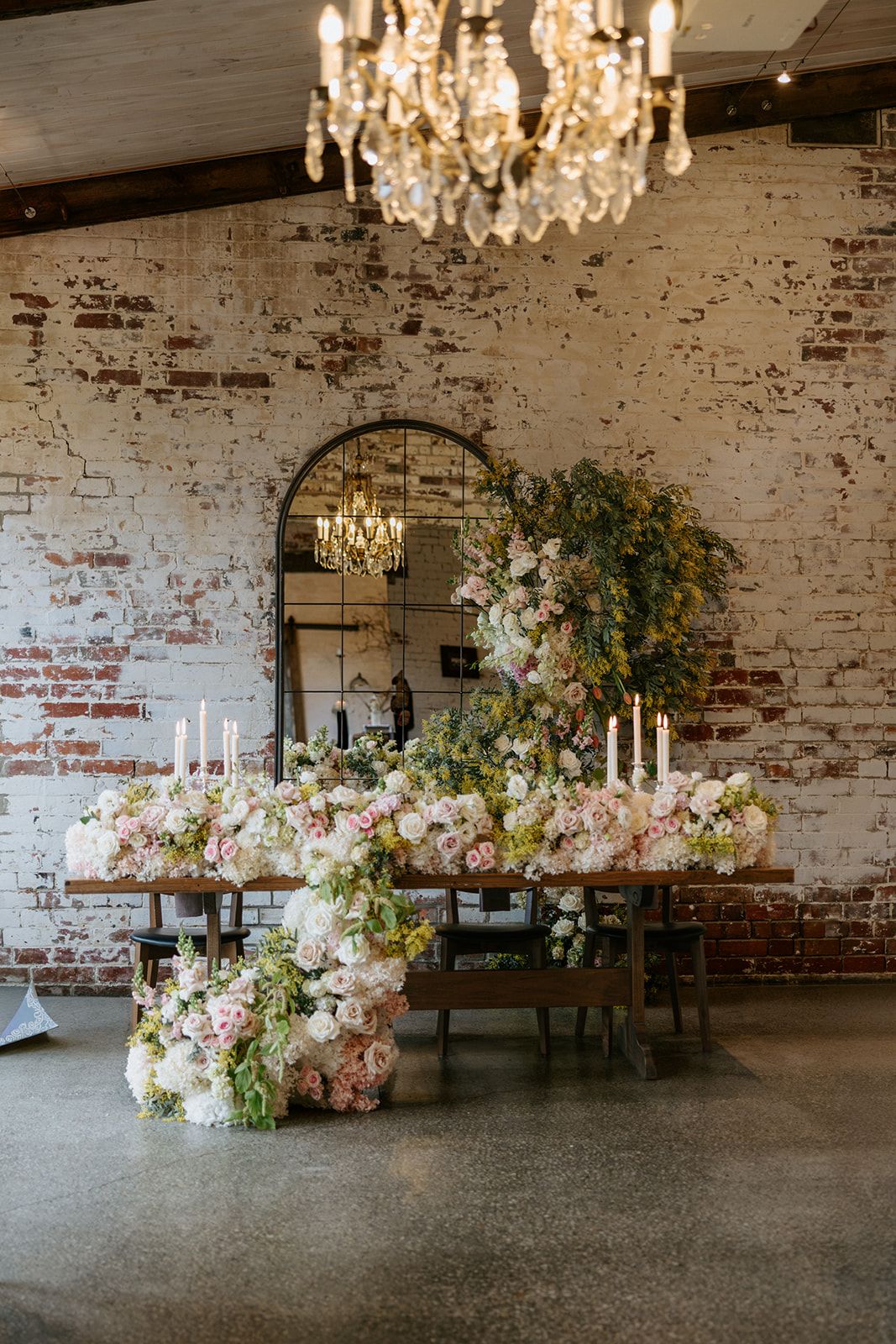 The Stables Restaurant at Stones of the Yarra Valley styled with a long floral table by Sugar Bee Flowers