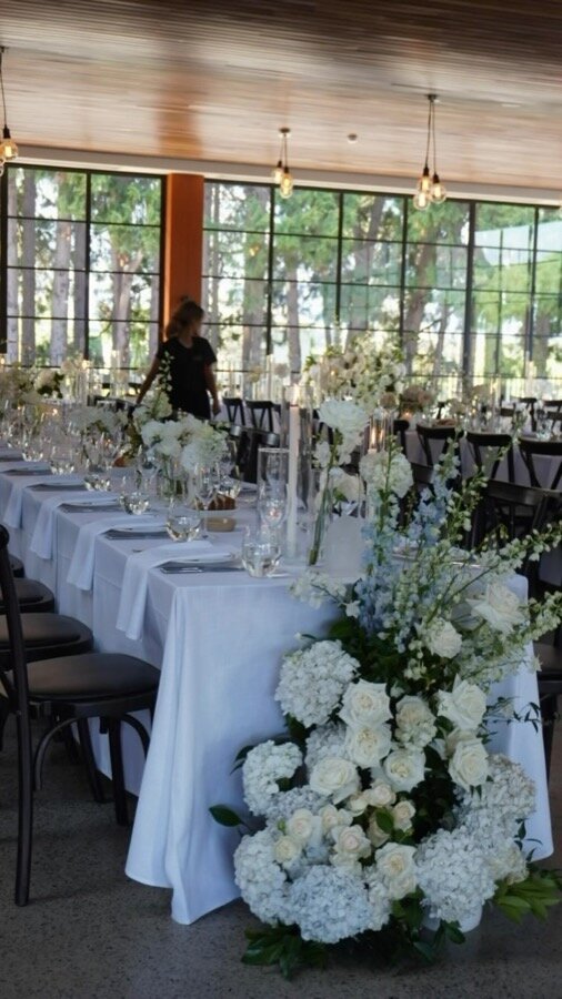 S&S's wedding flowers at Coombe Yarra Valley — whites and soft blues in the Italian Garden and reception room, by Sugar Bee Flowers